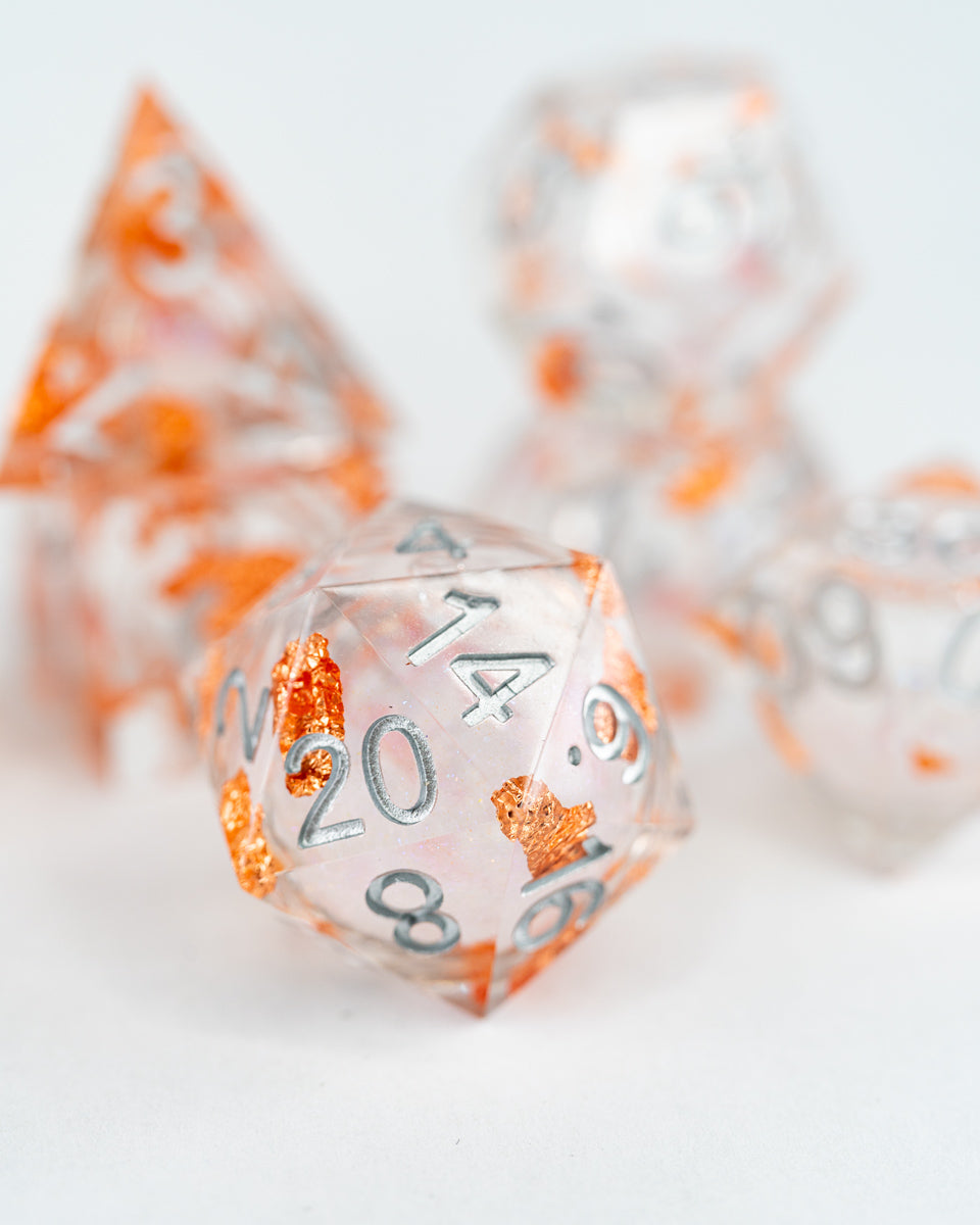 Alms for Angels | 7 Piece Liquid Core Dice Set - Emberglow Gaming