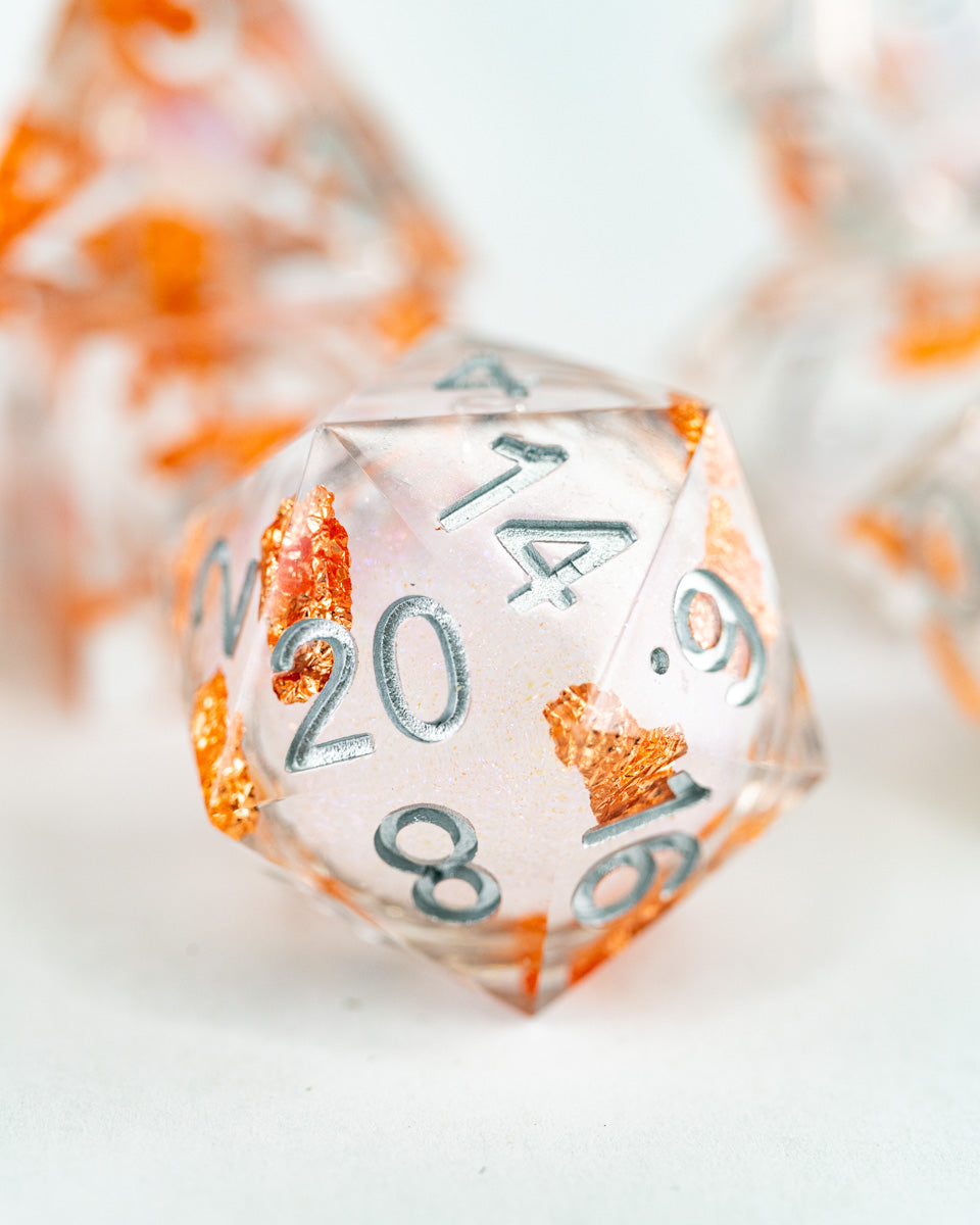 Alms for Angels | 7 Piece Liquid Core Dice Set - Emberglow Gaming