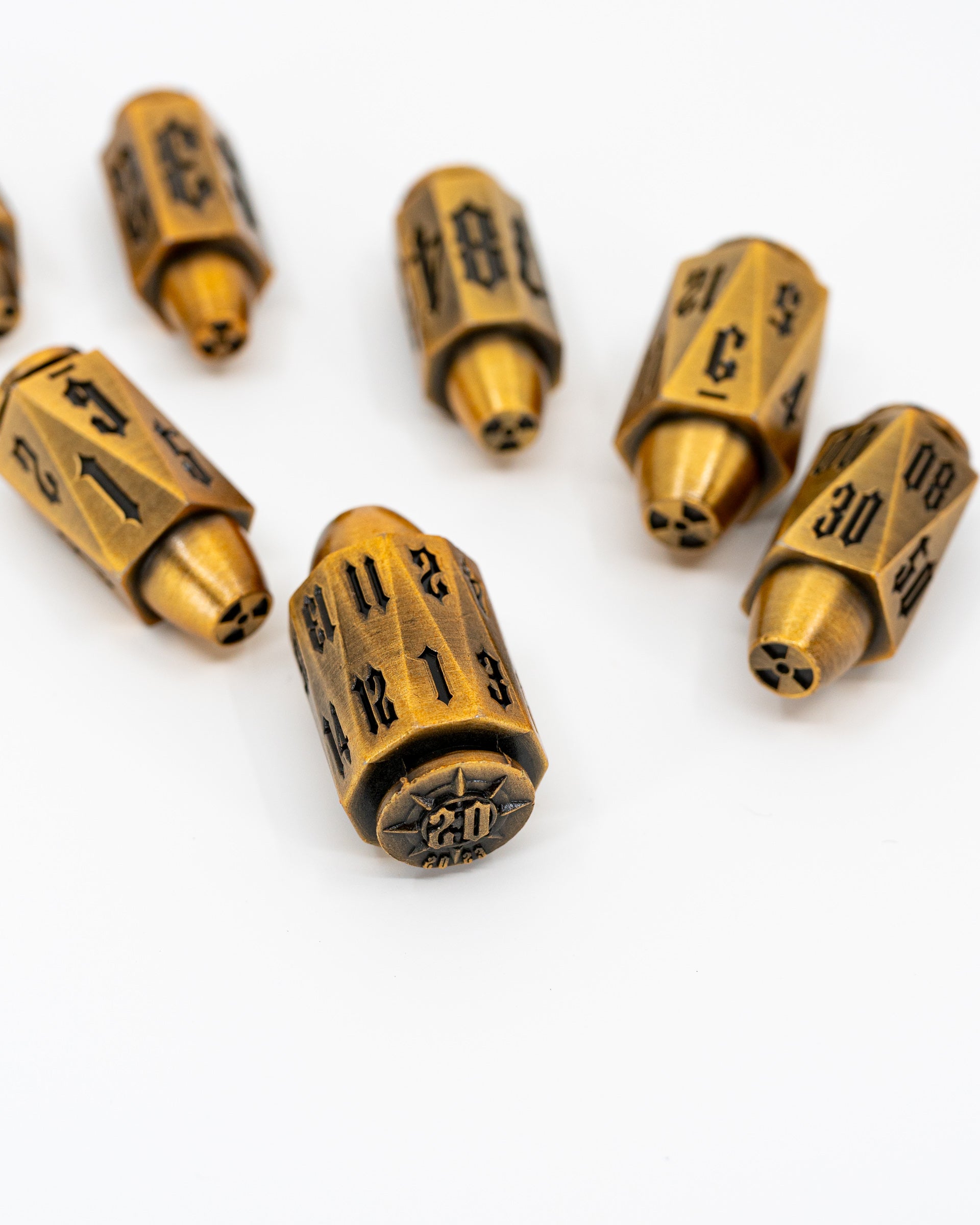 Alpha | Brass Bullets | 7 Piece Metal Dice Set - Emberglow Gaming