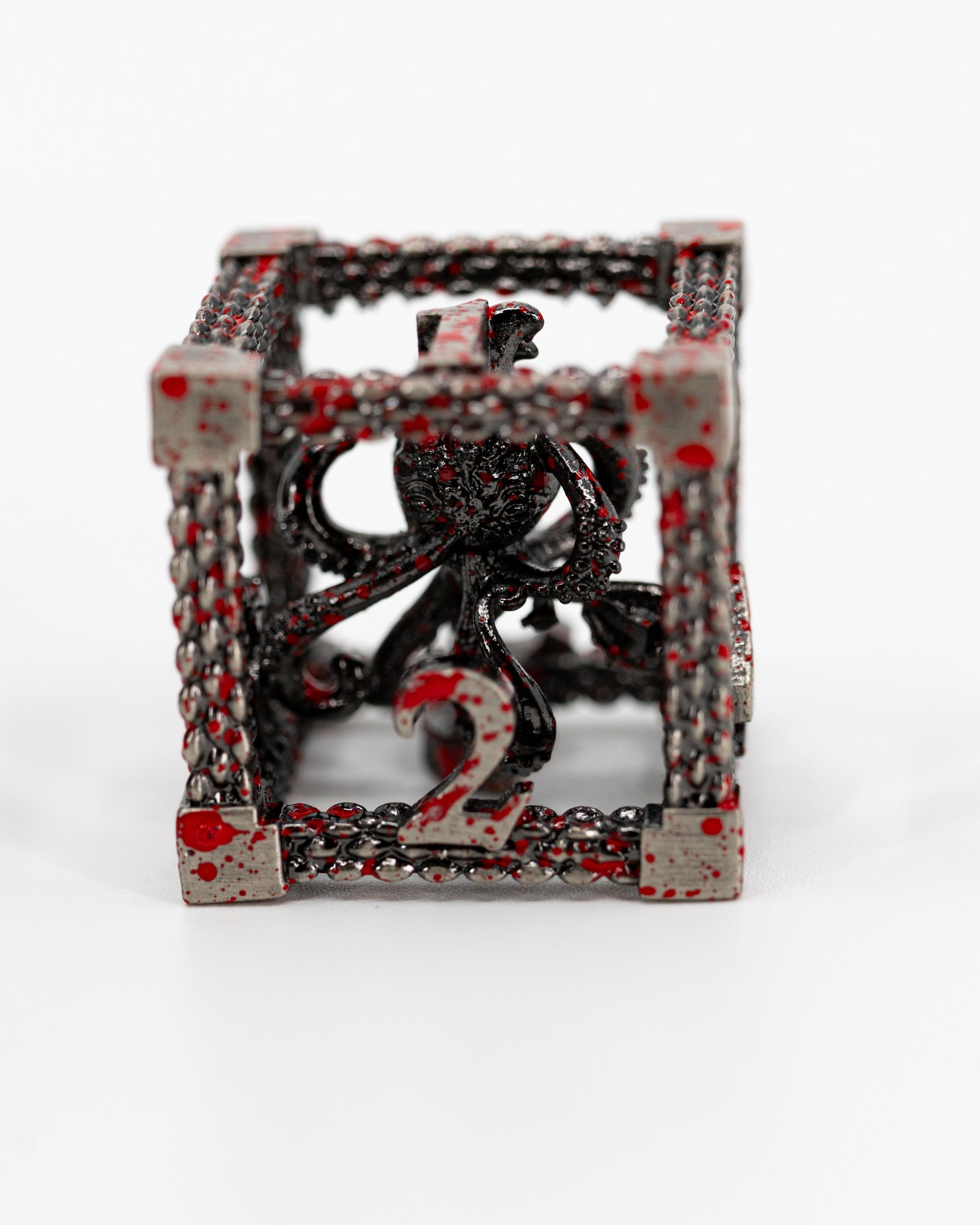 Scylla's Rage | Hollow Octopus Core | 7 Piece Hollow Metal Dice Set - Emberglow Gaming