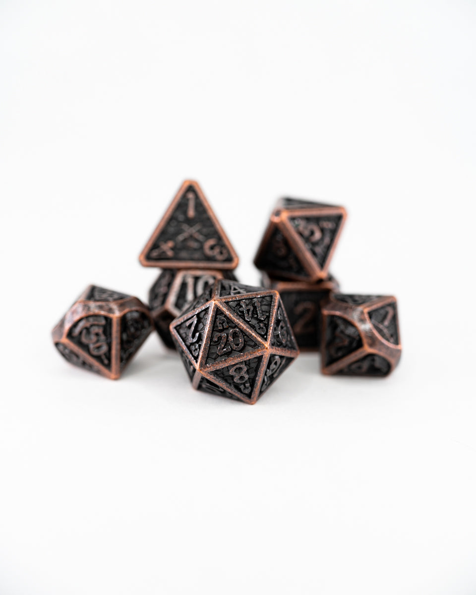 Ironmonger's Fist | 7 Piece Metal Dice Set - Emberglow Gaming