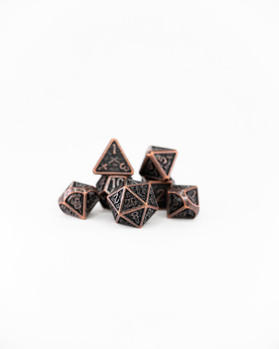 Ironmonger's Fist | 7 Piece Metal Dice Set - Emberglow Gaming