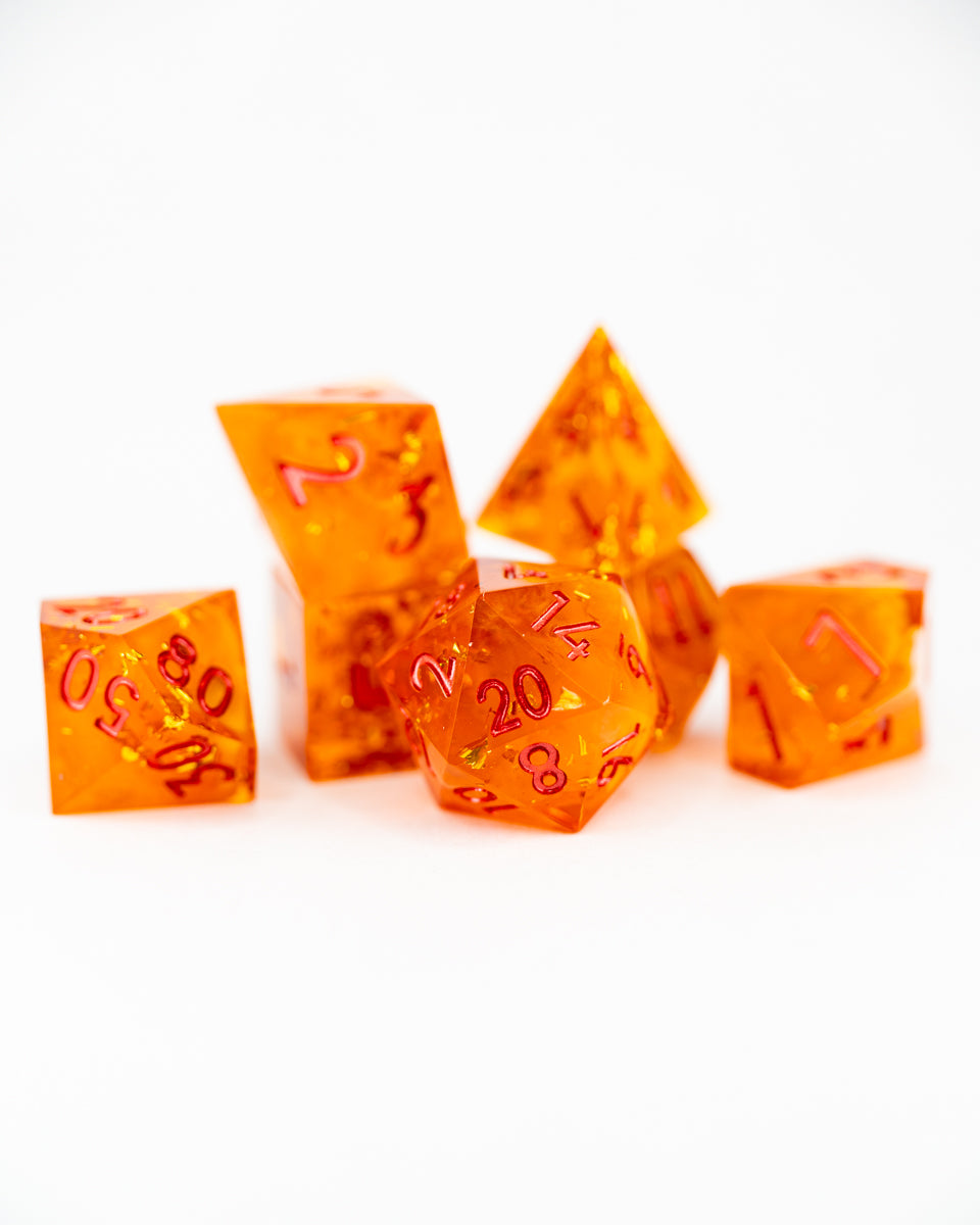 Glittergold's Snare | 7 Piece Sharp Edge Resin Dice Set - Emberglow Gaming