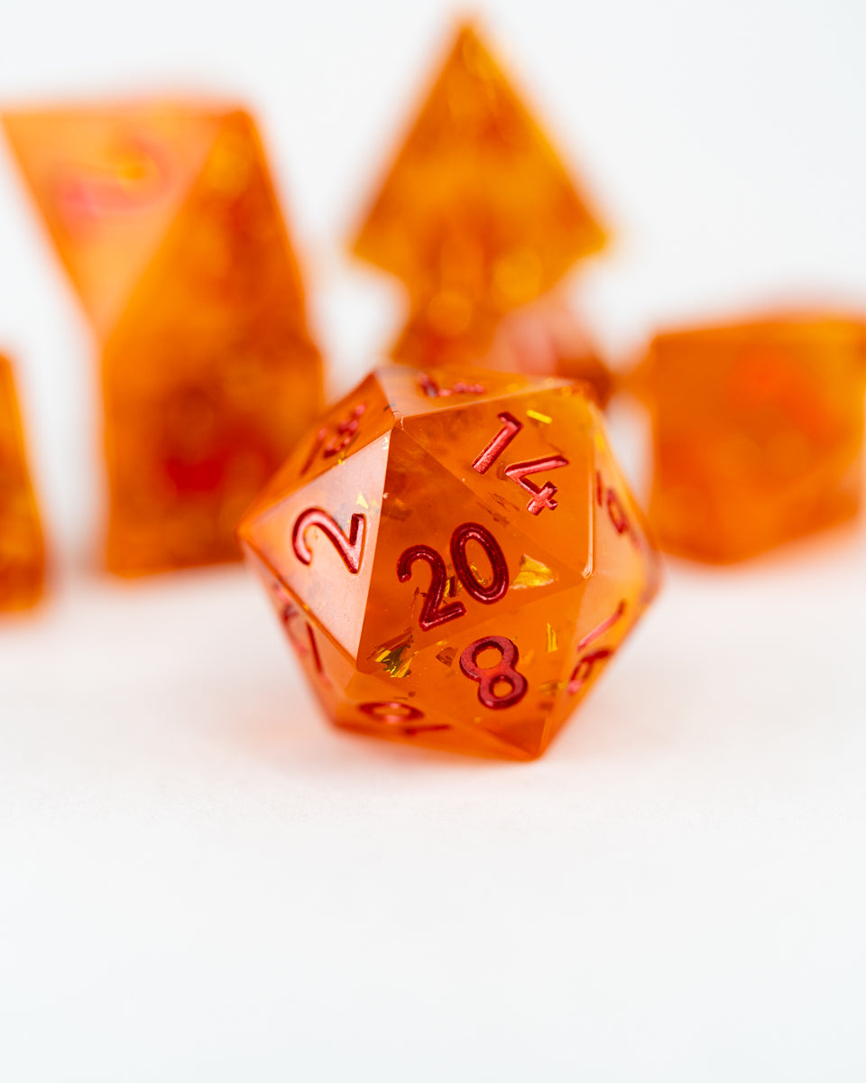 Glittergold's Snare | 7 Piece Sharp Edge Resin Dice Set - Emberglow Gaming