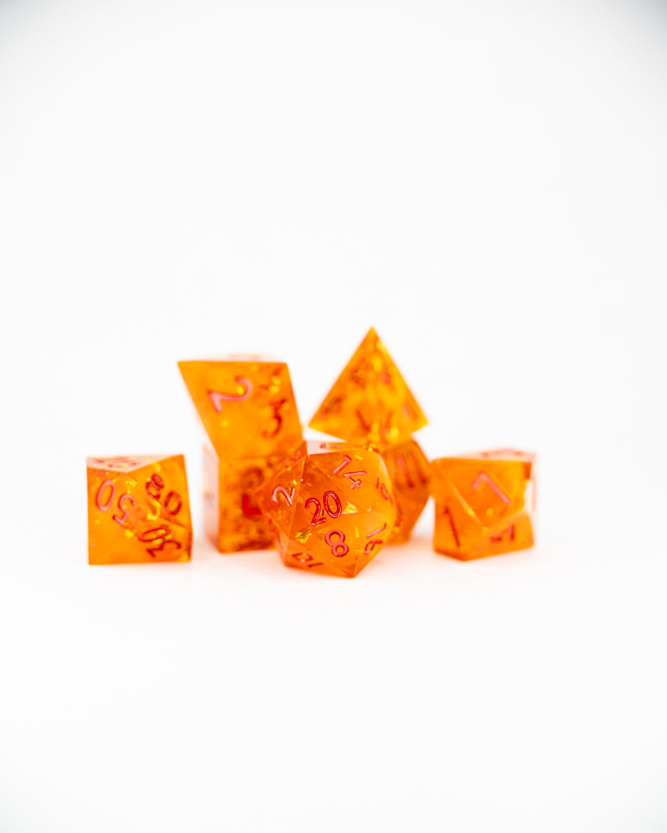 Glittergold's Snare | 7 Piece Sharp Edge Resin Dice Set - Emberglow Gaming