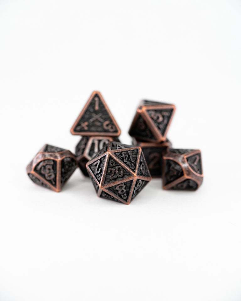 Ironmonger's Fist | 7 Piece Metal Dice Set - Emberglow Gaming